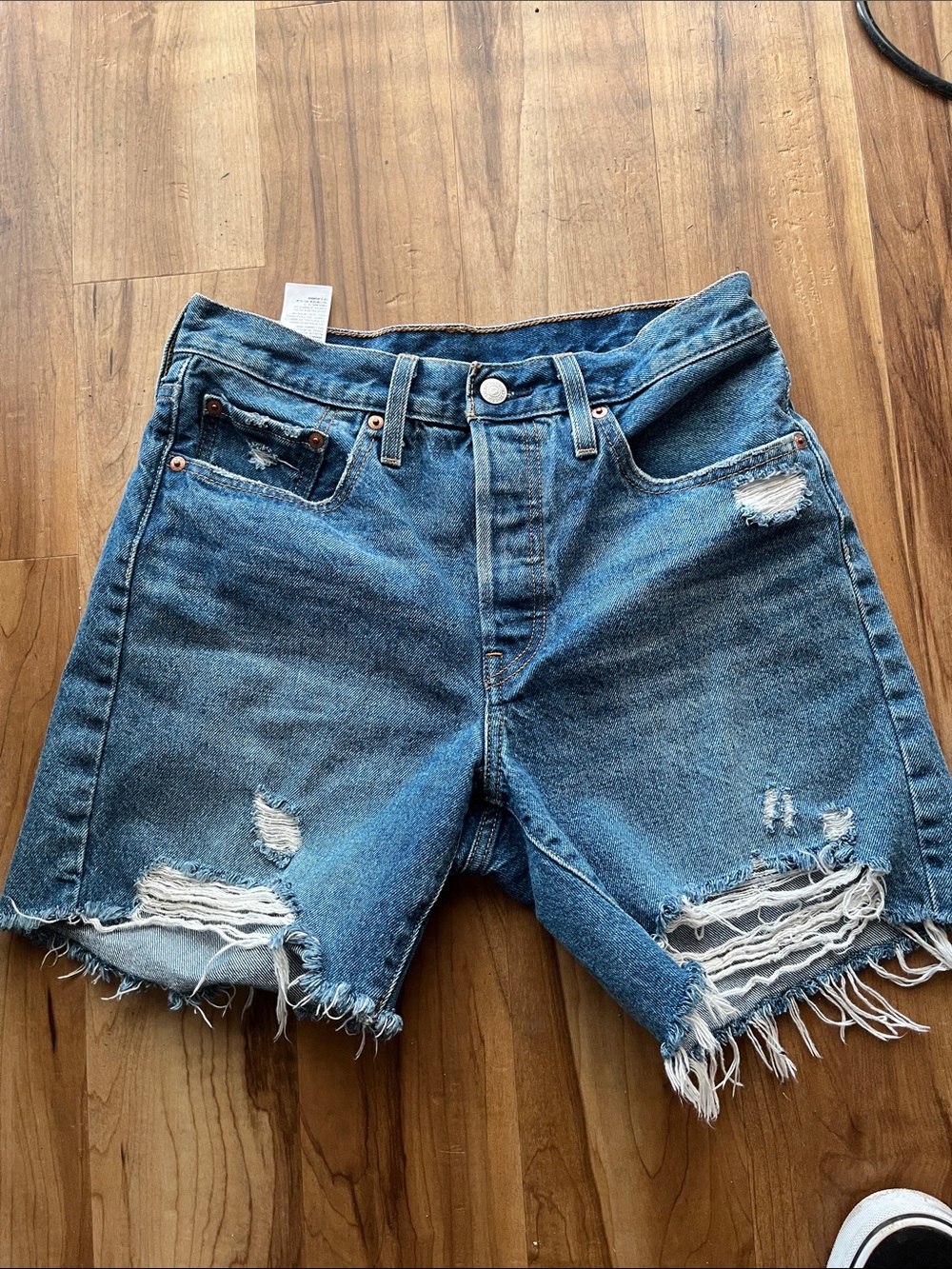 Levi’s 502 Distressed Mid-Rise Blue Denim Jean Shorts